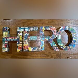 HERO comic book letters sign.